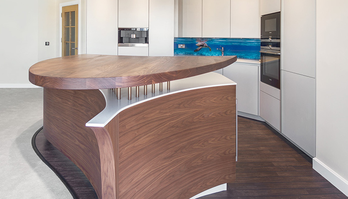 The brief from this client was to design a kitchen island which resembled a boat – located in a penthouse apartment and with views overlooking the Solent, they wanted to capture the panorama within their home