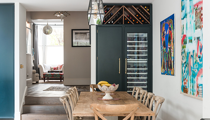 Using the space above a wine chiller to incorporate red wine storage is both practical and elegant in this scheme by Day True