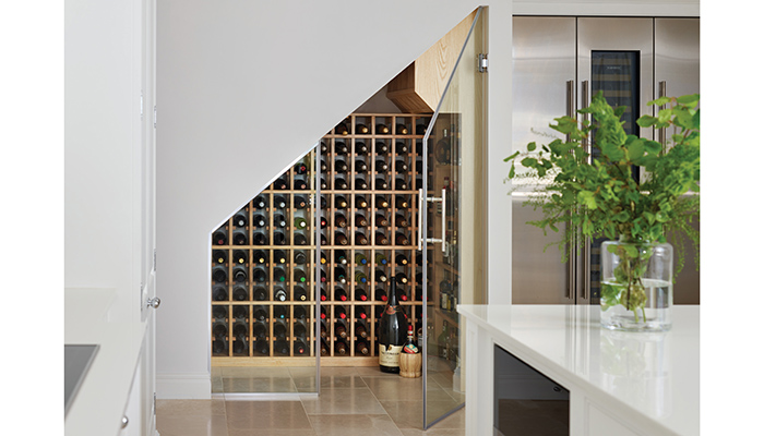 In this scheme with Tom Howley's Devine Collection, wine storage is kept separate but glass doors mean that the collection can be admired from the rest of the kitchen space