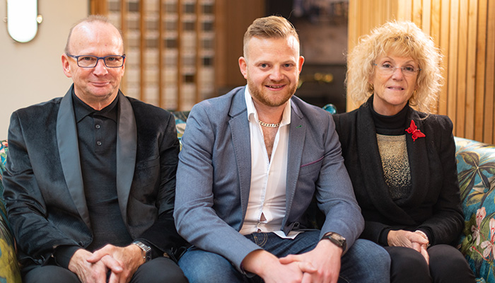 Portraits show commercial MD Joe Mühl with his parents and Ocean Bathrooms founders MD Robert Mühl and finance director Sharon Mühl, at the new boutique-style showroom in Poole