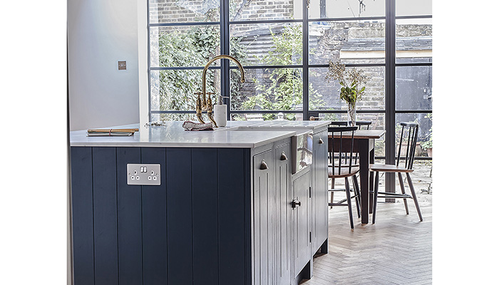 The kitchen bins are also integrated into the island unit so they’re kept completely out of sight