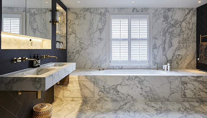 Coliseum Arabascato marble-effect porcelain slab – photo by Kallums Bathrooms