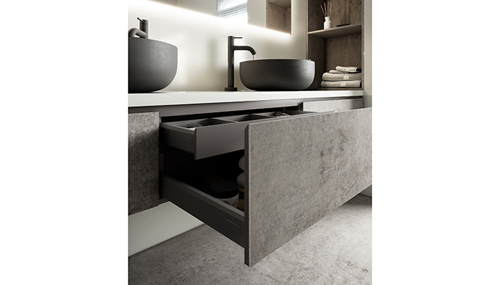 4mm Dekton Slim in Kovik is an ideal textured surface options for door and drawer fronts. It has been used here to clad handleless cabinetry drawers in a contemporary wet room Image: Cosentino