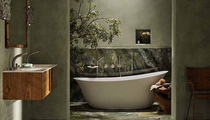 Nahla freestanding bath, made from engineered stone, with Ixora stainless steel brassware