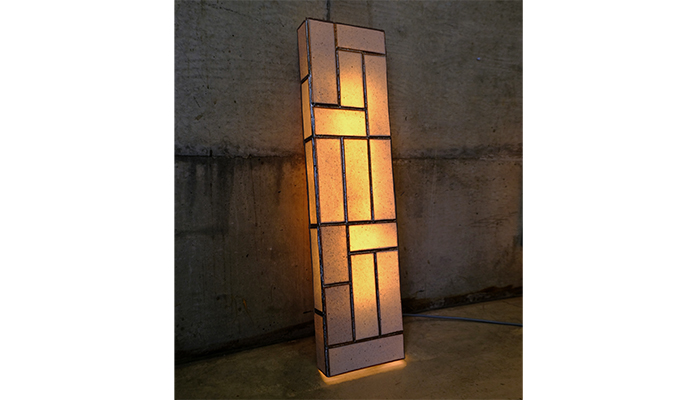 Light made from ReCinder by Rosy Napper, showing off the translucent quality of this recycled material made from discarded ceramic and waste ash