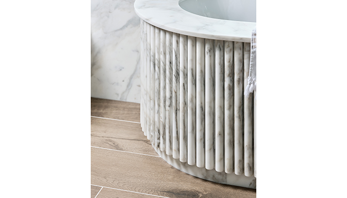 Bath with wide ledge using Ca' Pietra's Zen Mosaic Reed tiles