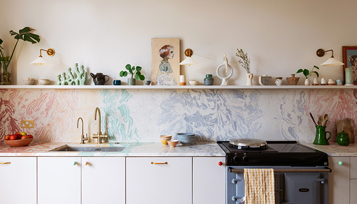 The Albany Road project, by Naked Kitchens shows how using the same material for worktop and splashback creates a seamless flow and cohesive design