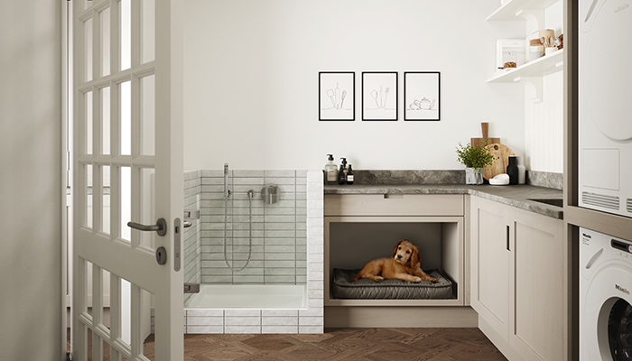 A spacious utility room designed with your pet in mind by Second Nature with their Mornington Kitchen in Stone Outline and Cosentino Sensa Vancouver worktop with a bespoke shower unit and ingenious integrated dog bed