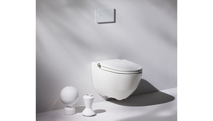 Designed by Peter Wirz to look like a conventional toilet, Laufen’s Red Dot award-winning Riva Cleanet shower WC can be operated by the stainless steel side button, which controls the selection of shower functions, or via a remote control unit