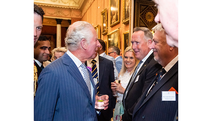 Roman attends Queen's Award Ceremony at Buckingham Palace