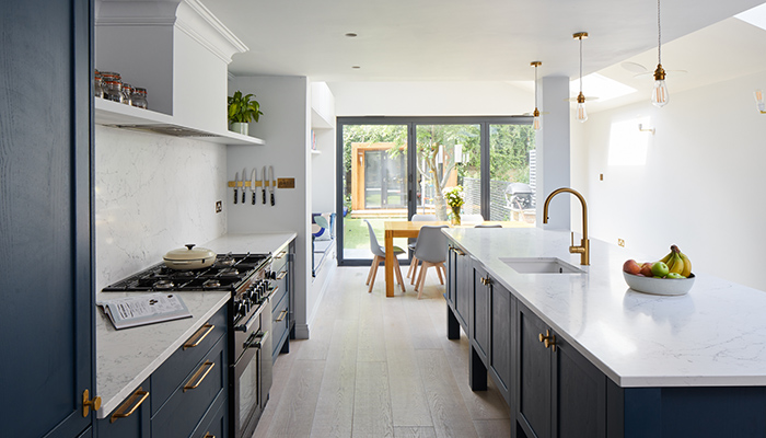 How PAD created a light space while using vibrant dark blue cabinetry