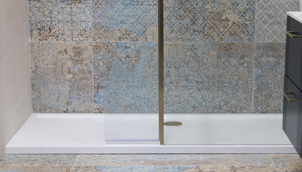 Available in 35 size options in a variety of shapes and configurations, Roman’s Anti-Slip shower trays are 40mm high and have a gel coat finish for cleanability and durability. They come with a 90mm chrome Fast Flow waste, which is also available in Brushed Brass, Matt Black and White