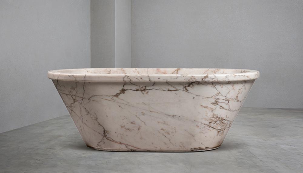 Lapicida's roll-top bath in Veined San Marino Marble