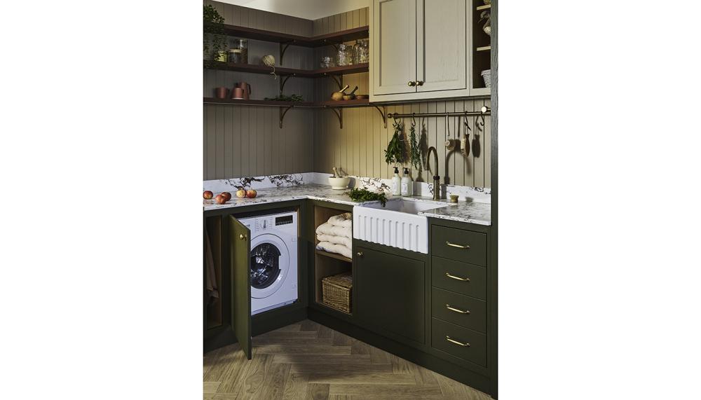 Warm taupe neutrals and earthy greens: wall cabinets in Naked's Holt Latte and floor cabinets in Samphire green
