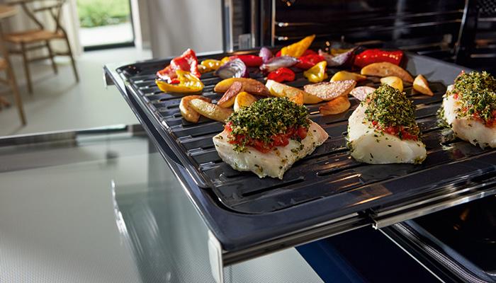 The Miele H2766-1 BP Oven with Air Fry function and perforated Air Fry tray crisps up dishes when food is spread out evenly and cooked in the Air Fry mode, that combines Fan Plus and Top Heat with the relevant temperature for the dish